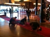 Event staff laying down the red carpet